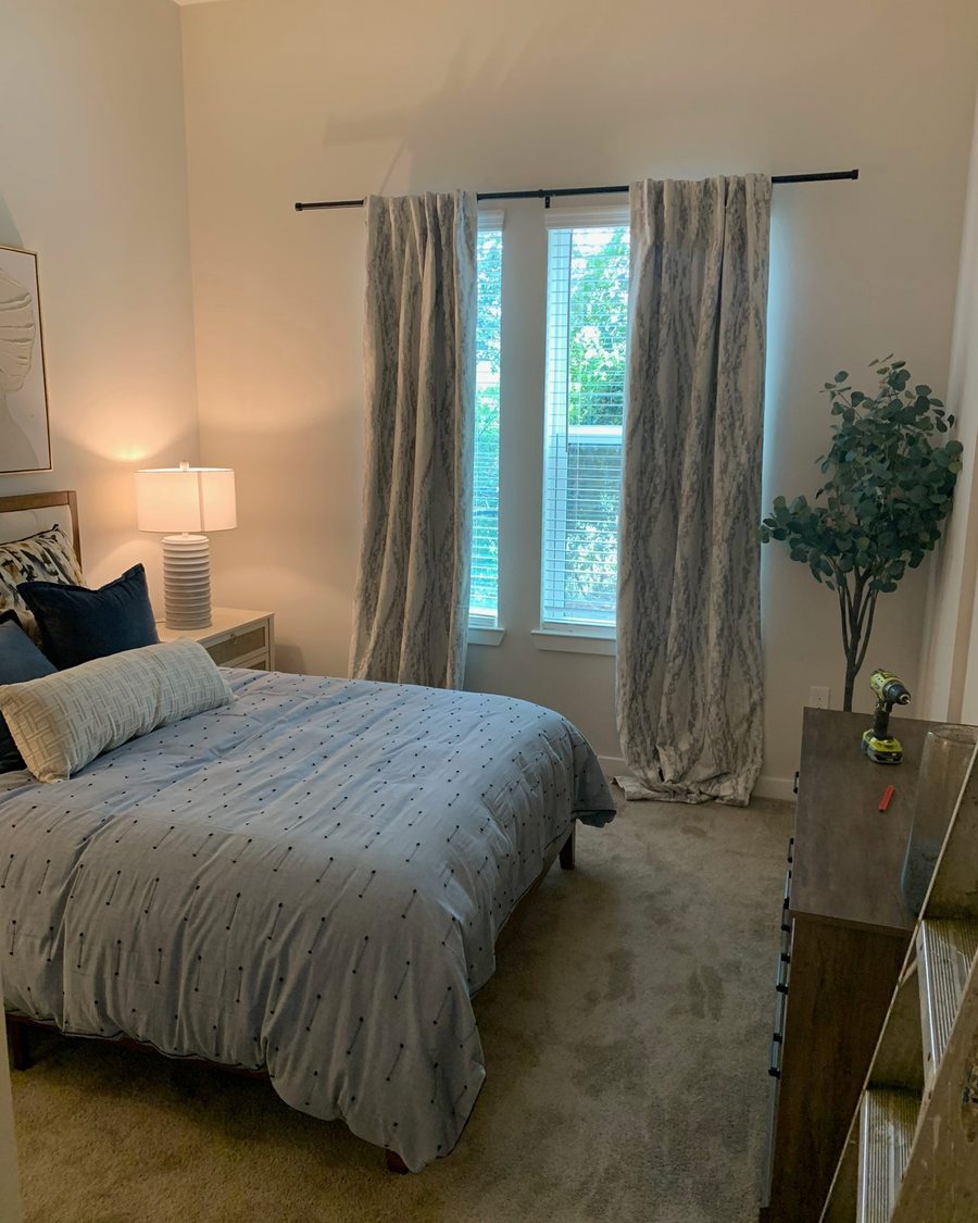 Model apartment bedroom furnished and staged by Red Line Works